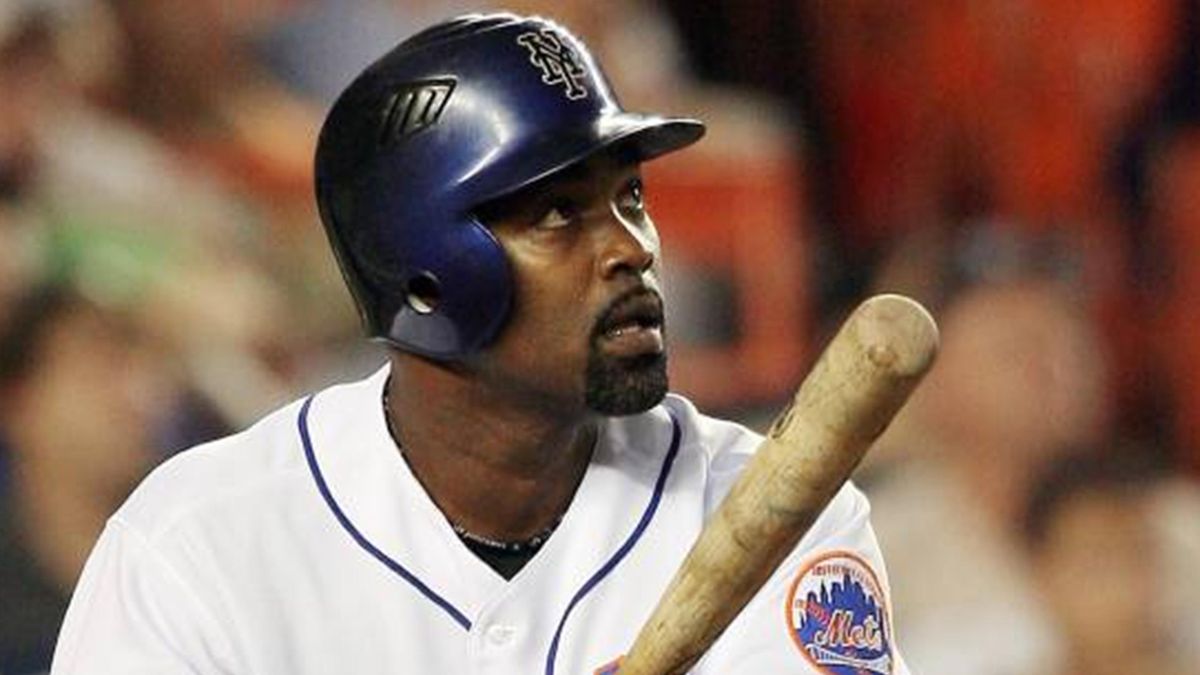 New York Mets' Carlos Delgado celebrates his ninth-inning, game