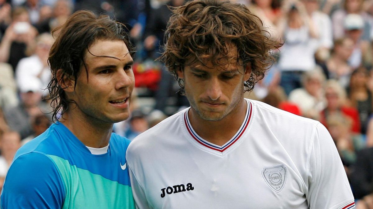 TENNIS Rafael Nadal congratulates Feliciano Lopez after losing to his fellow Spaniard in the quarter-finals at the AEGON Championships at Queen's Club