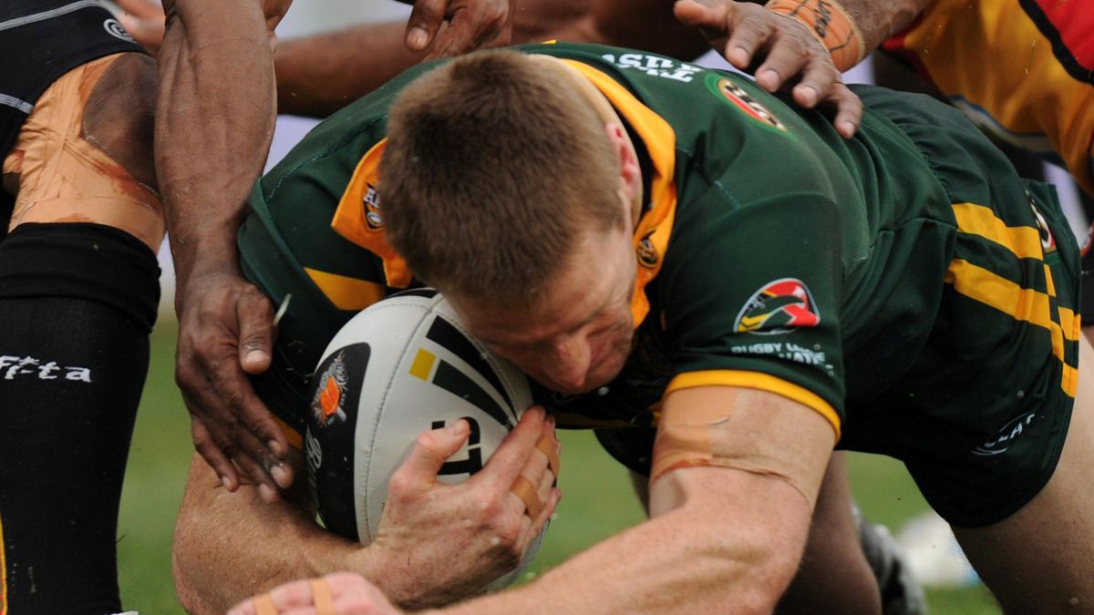 Australia's Brent Tate scores a try against Papua New Guinea during their Four Nations match at Parramatta Stadium, Sydney, Sunday, Oct. 24, 2010 (AAP AUSTRALIA USE ONLY)