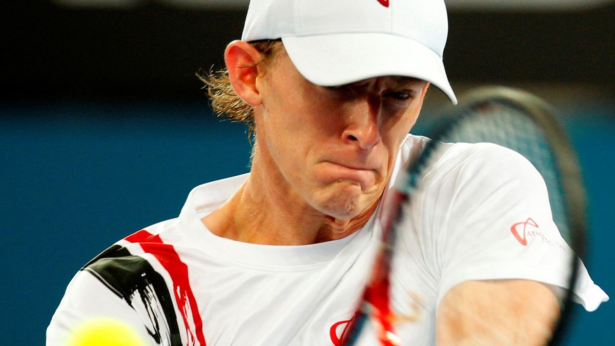 Kevin Anderson of South Africa returns the ball to Andy Roddick of the U.S. during their men's singles semi-final match at the Brisbane International tennis tournament, January 8, 2011.