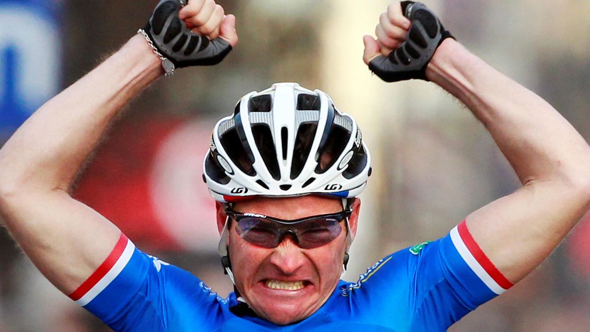 Europcar team rider Thomas Voeckler of France celebrates winning the fourth stage of the Paris-Nice race