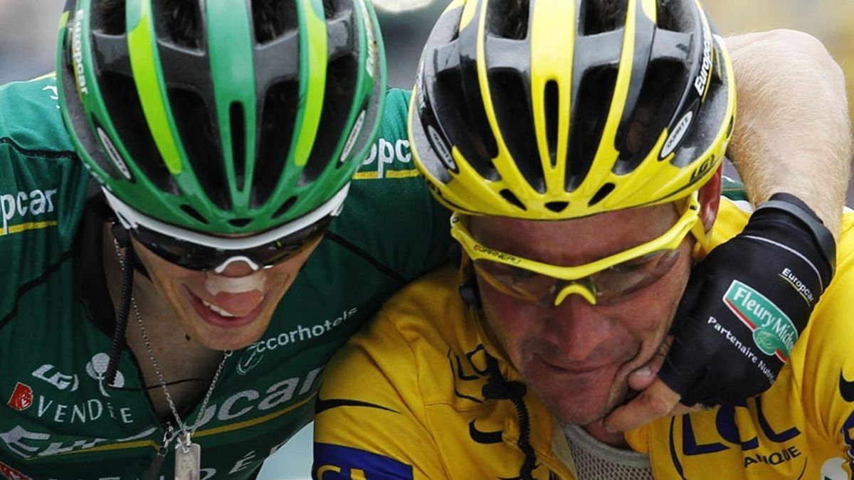 2011 Tour de France Europcar rider Thomas Voeckler (R) of France and his teammate Pierre Rolland