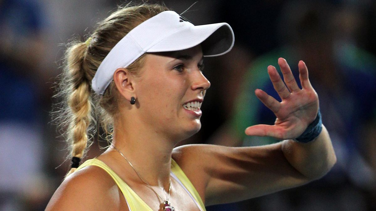 Caroline Wozniacki of Denmark acknowledges the crowd after defeating Bethanie Mattek-Sands of the US in their women's singles session 4 match on day three of the Hopman Cup Tennis Tournament in Perth on January 2, 2012. Wozniacki won the match 7-6,(7-4), 