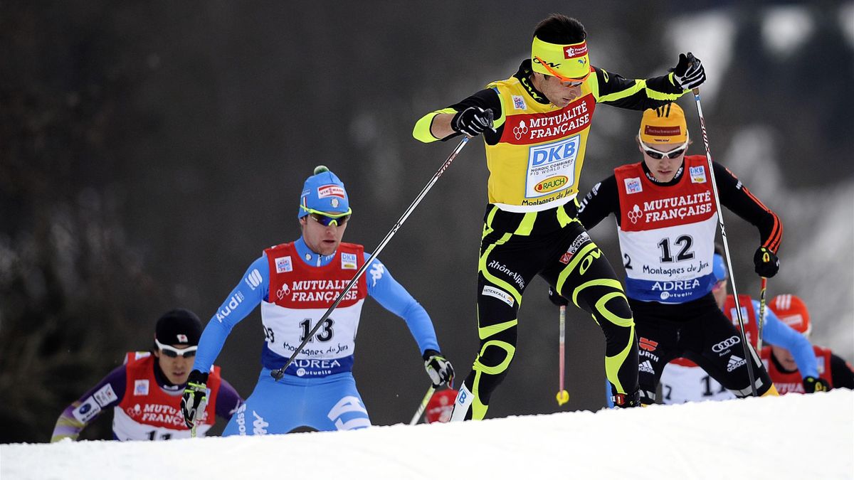 French skier Jason Lamy Chappuis competes ahead of Italian skier Alessandro Pittin (2ndL) and German skier Fabian Riessle (R) during the 10th FIS World Cup Nordic Combined competition,on January 13, 2011 in Chaux-Neuve