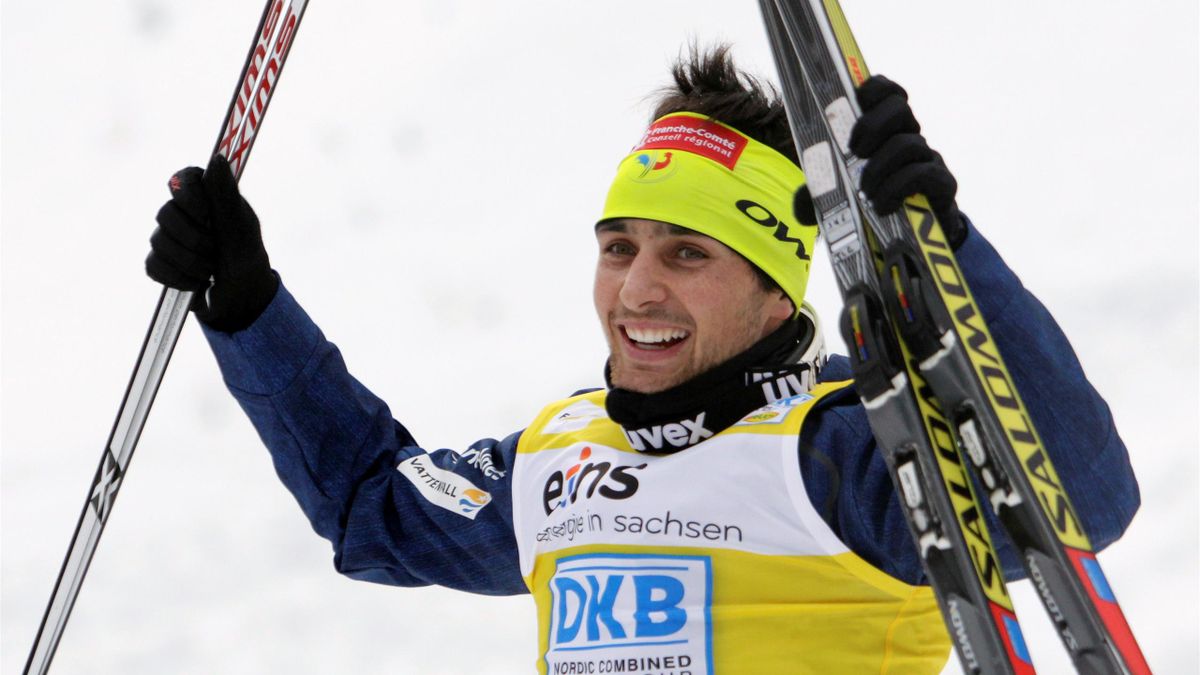 France's Jason Lamy Chappuis celebrates after winning the LH Individual Gundersen 10 km race at the Nordic Combined World Cup in Klingenthal February 19, 2012