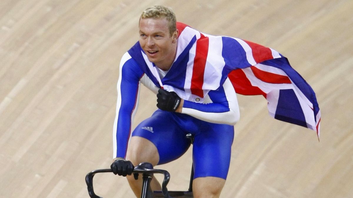 Chris Hoy hiolds a British flag after winning gold at the Beijing Olympics, 2008