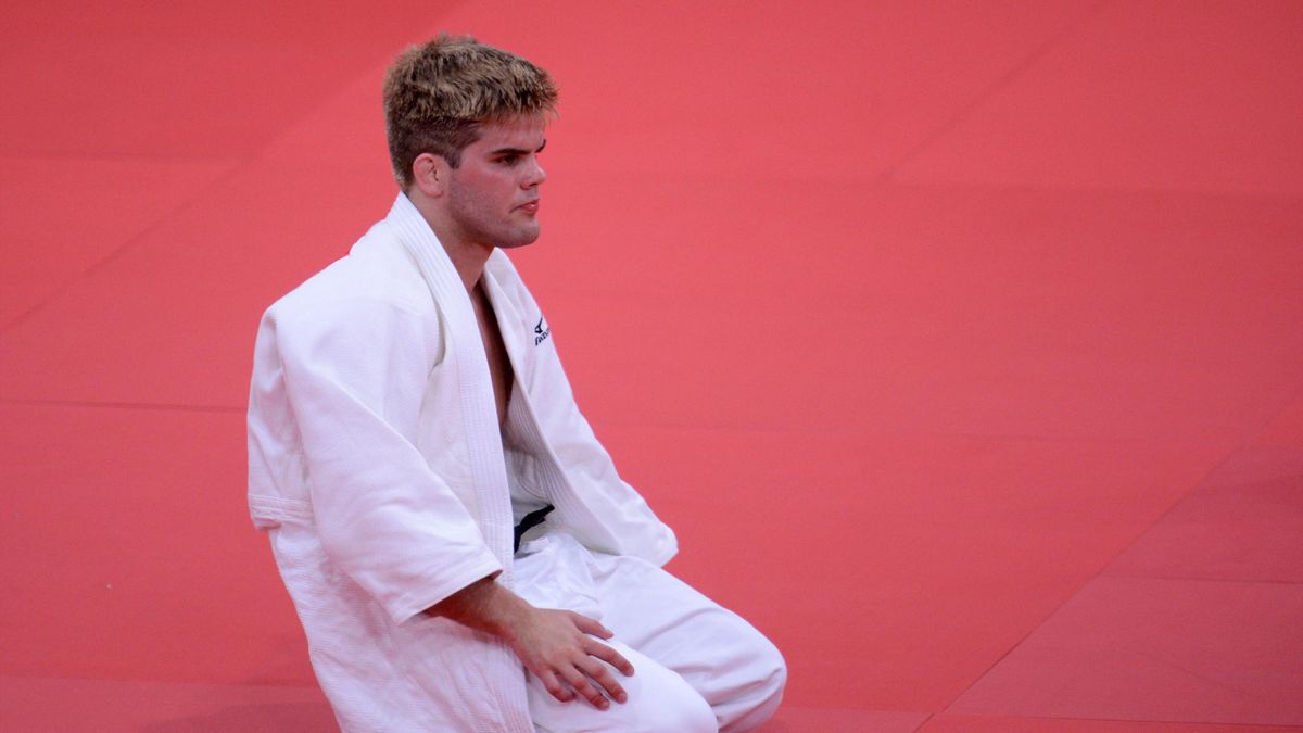 United States' Nicholas Delpopolo reacts after losing against Mongolia's Nyam-Ochir Sainjargal during their men's -73kg judo contest repechage matc