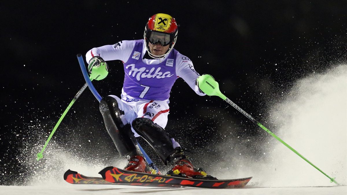 Marcel Hirscher of Austria clears a gate during the first run in the men's World Cup slalom race in Madonna di Campiglio