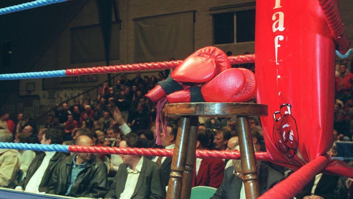 Generic shot of boxing ring, gloves and stool (PA Photos)