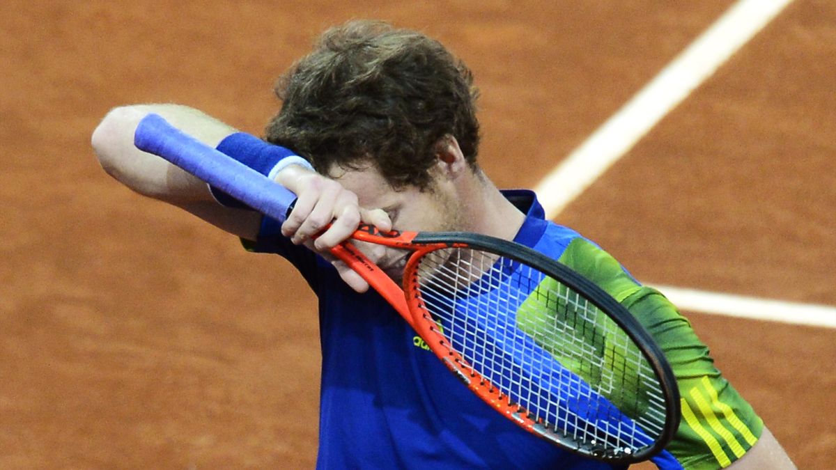 British player Andy Murray reacts during his men's singles third round tennis match against French player Gilles Simon at the Madrid Masters at the Magic Box (Reuters)