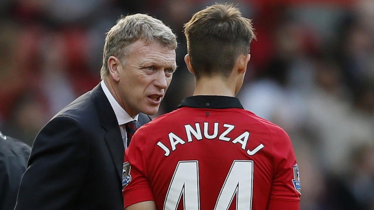 Manchester United manager David Moyes talks to Adnan Januzaj (Reuters)