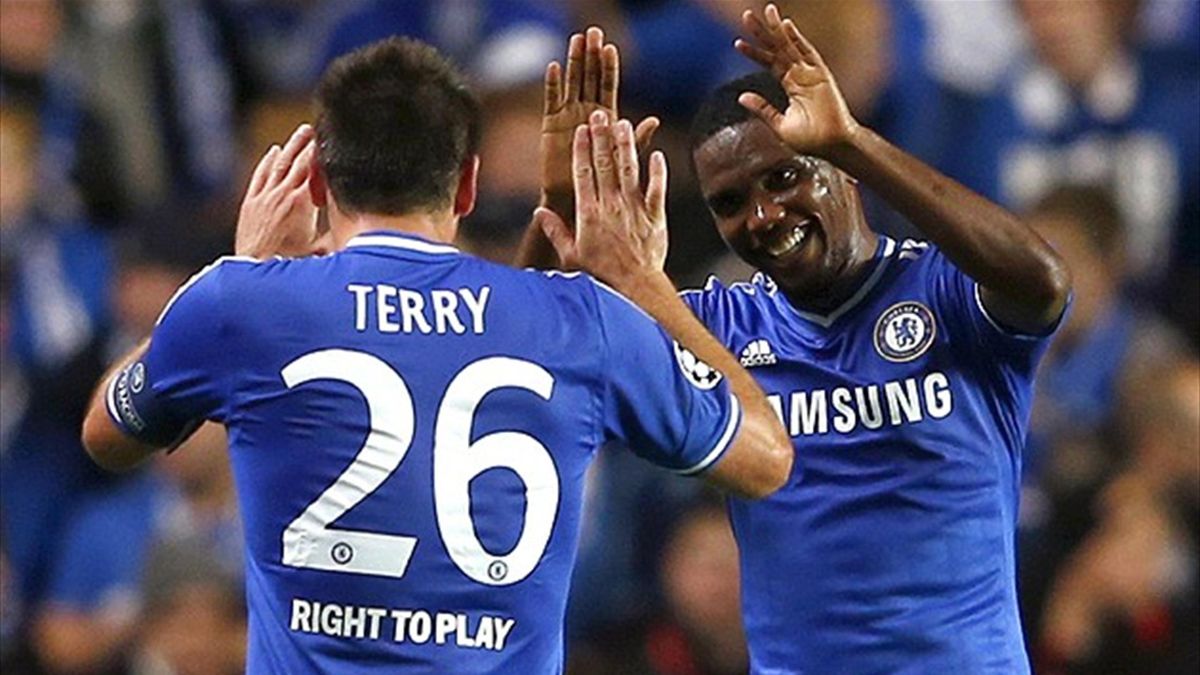 Chelsea's Samuel Eto'o (R) celebrates with teammate John Terry after scoring a goal against FC Schalke 04 during their Champions League soccer match at Stamford Bridge in London November 6, 2013. (Reuters)