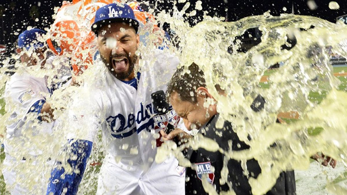 The Los Angeles Dodgers' Matt Kemp celebrates after his fifth
