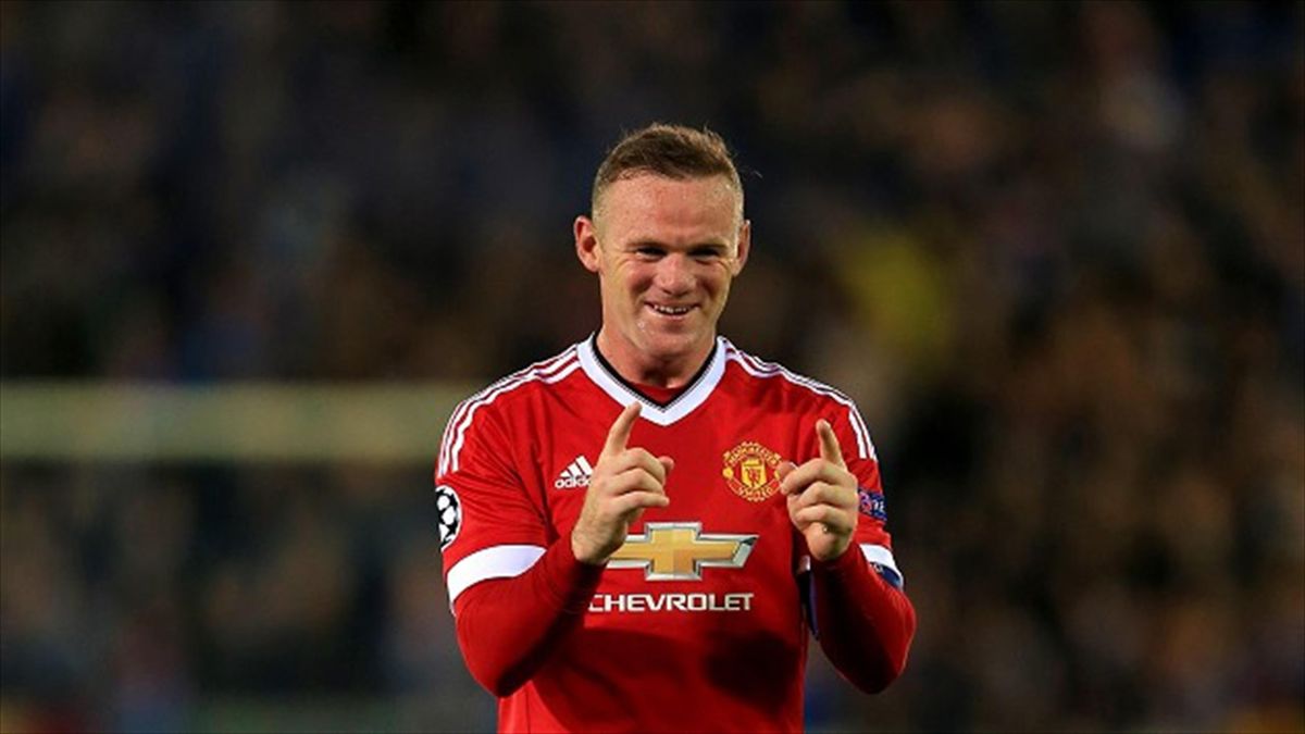 Manchester United's Wayne Rooney celebrates his team's fourth goal