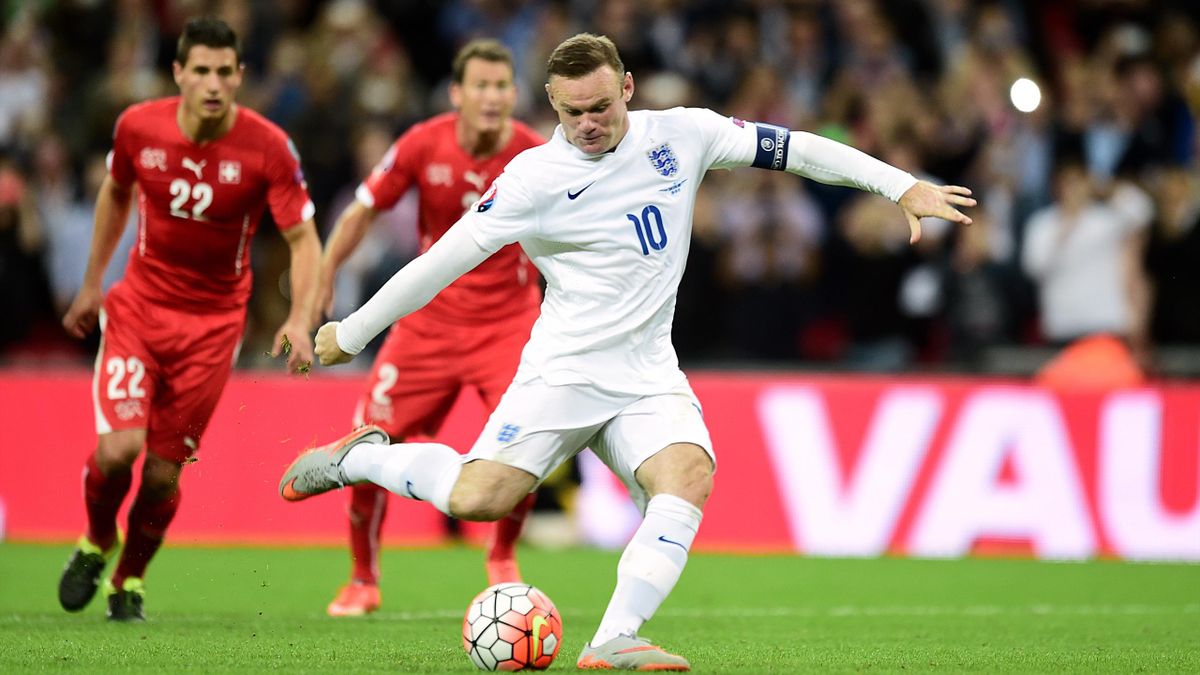 Wayne Rooney scores his record-breaking 50th England goal from the penalty spot