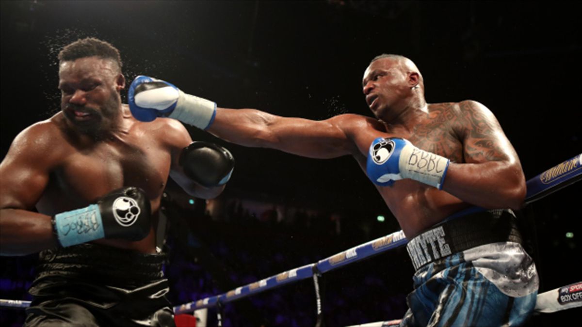 Dillian Whyte, right, lands a punch on Dereck Chisora