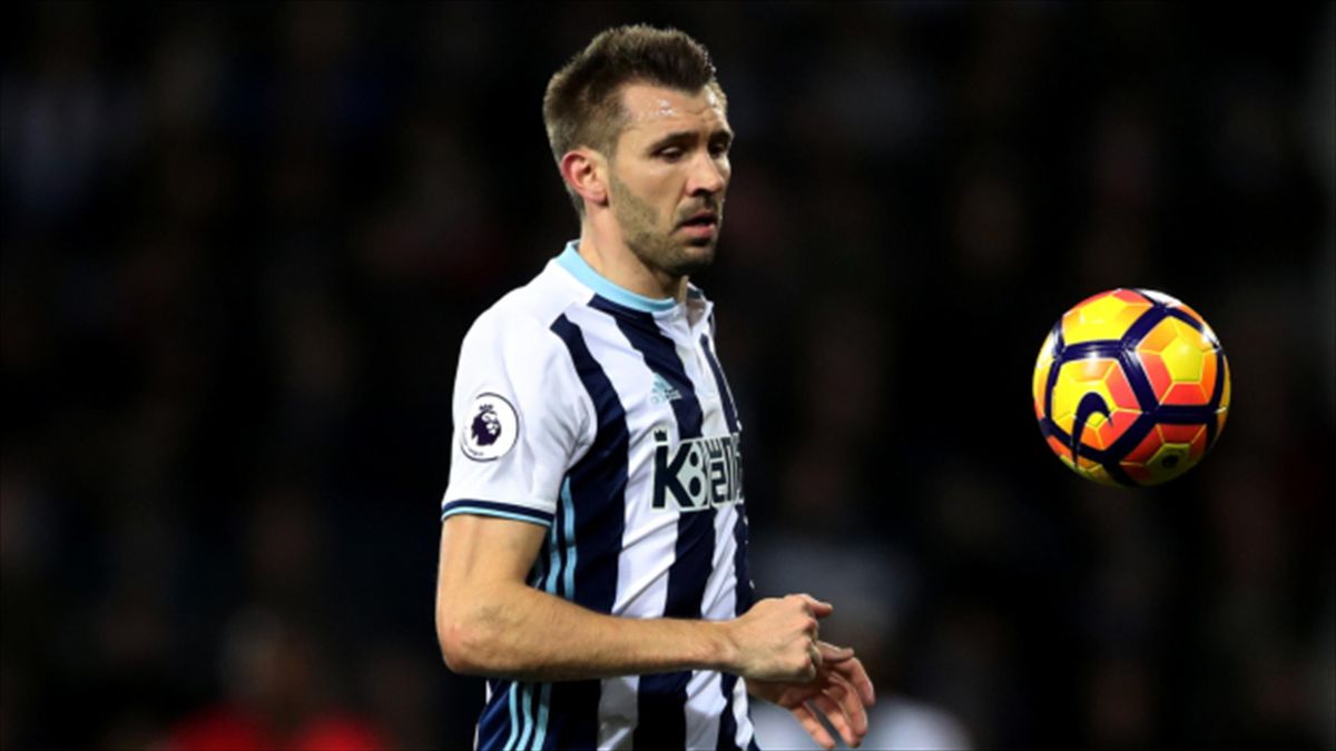 Gareth McAuley stunned by ridiculous wages in modern game