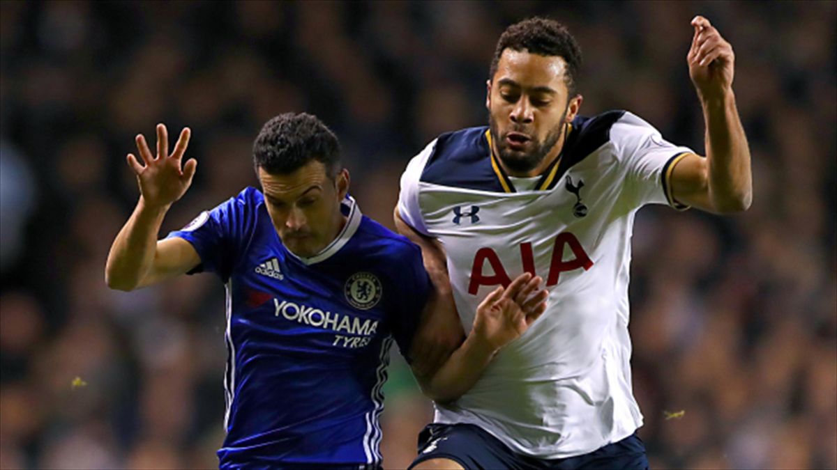 Mousa Dembele, right, battles with Chelsea forward Pedro