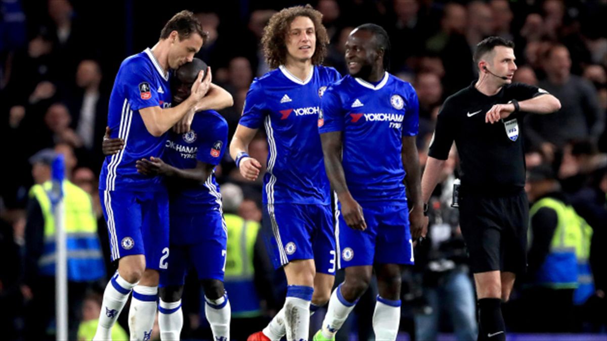 Chelsea's N'Golo Kante, second left, celebrates scoring against Manchester United