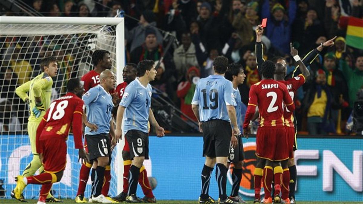Uruguay's Luis Suarez, number nine, was sent off for a handball against Ghana but his team ultimately went through