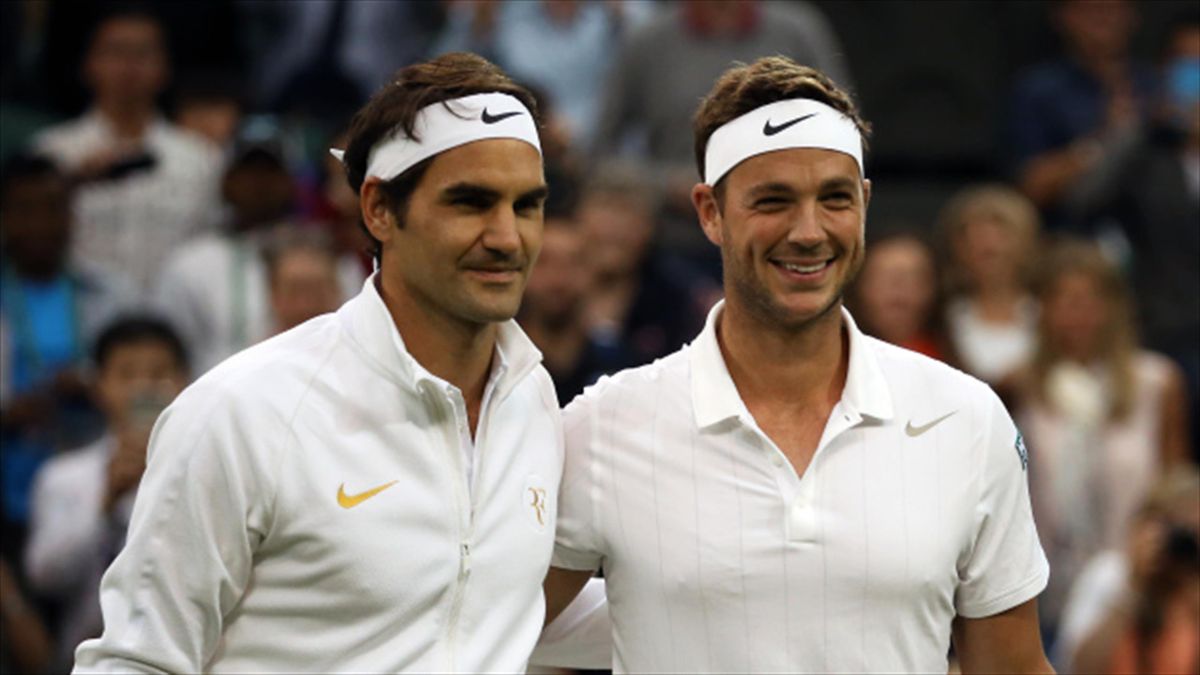 Marcus Willis (right) lining up for his second-round match against Roger Federer at Wimbledon