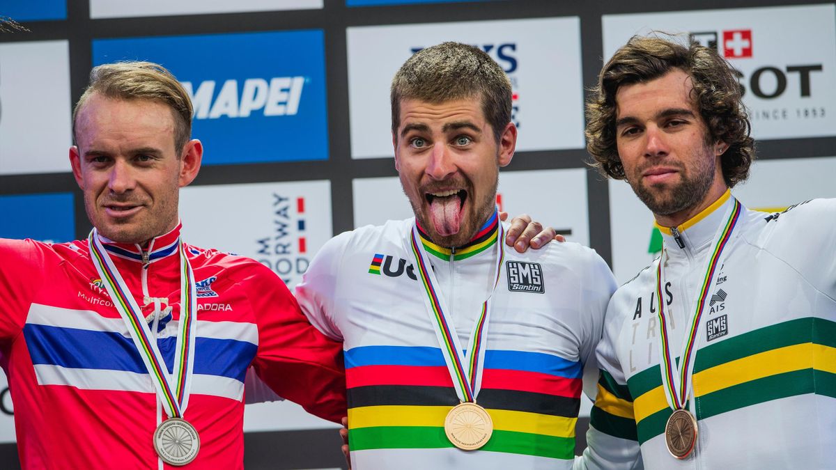Gold medalist Slovakia's Peter Sagan (C), silver medalist Norway's Alexander Kristoff (L) and bronze medalist Australia's Michael Matthews pose with their medals after the men elite road race of the UCI Cycling Road World Championships in Bergen, on Septe