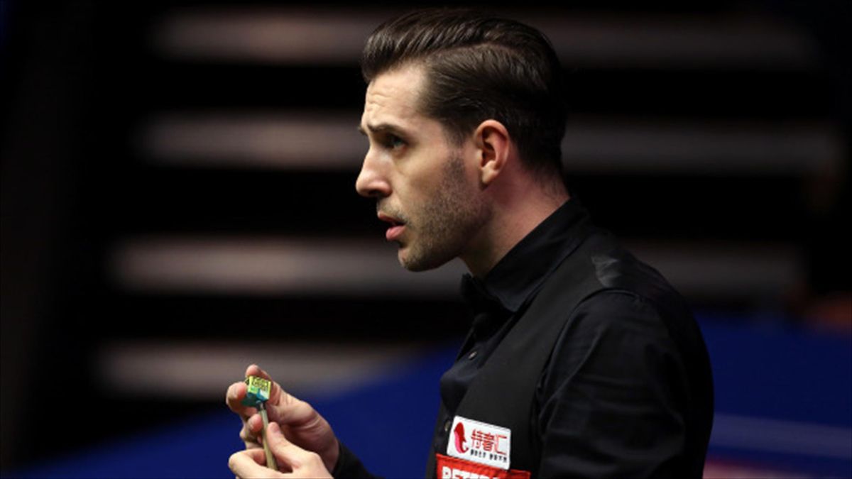 Defending champion Mark Selby crashed out of the Betway UK Championship
