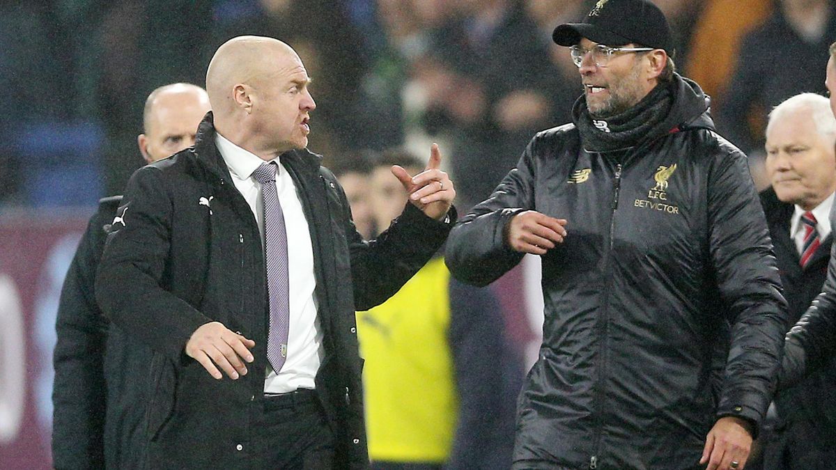 Sean Dyche, left, and Jurgen Klopp did not see eye to eye over Burnley's tackling