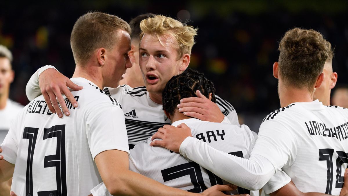 Serge Gnabry of Germany celebrates after scoring his team's first goal with team mates during the International Friendly between Germany and Argentina at Signal Iduna Park on October 09, 2019 in Dortmund, Germany