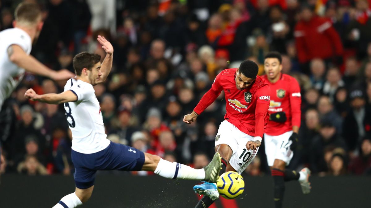 Marcus Rashford of Manchester United scores his team's first goal during the Premier League match between Manchester United and Tottenham Hotspur at Old Trafford on December 04, 2019 in Manchester, United Kingdom
