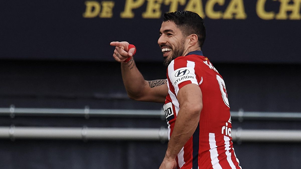 Luis Suarez double gives Atletico Madrid win over Cadiz and a 10