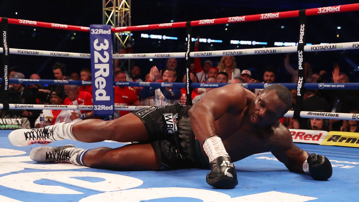 Tyson Fury knocks out Dillian Whyte in sixth round to defend WBC heavyweight title at Wembley Stadium