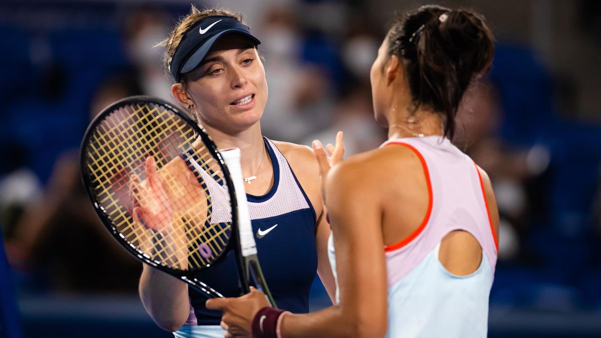 Paula Badosa of Spain and Qinwen Zheng of China shake hands at the net after their second round match on Day 3 of the Toray Pan Pacific Open at Ariake Coliseum on September 21, 2022 in Tokyo, Japan