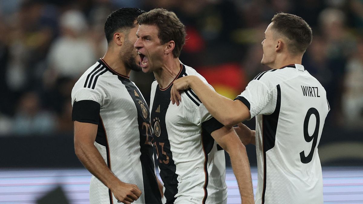 Germany 2-1 France Thomas Muller and Leroy Sane strike as managerless Germany beat France in Dortmund