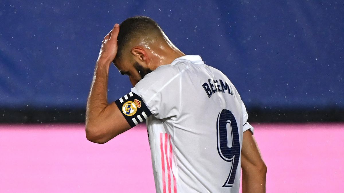 Real Madrid's French forward Karim Benzema gestures during the Spanish League football match between Real Madrid CF and Real Betis at the Alfredo di Stefano stadium in Valdebebas, on the outskirts of Madrid, on April 24, 2021.