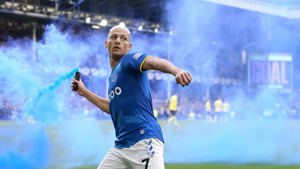 Richarlison of Everton celebrates his goal with a flare during the Premier League match between Everton and Chelsea at Goodison Park on May 01, 2022 in Liverpool, England