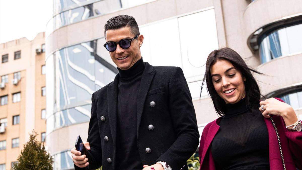 Portuguese soccer player Cristiano Ronaldo leaves from the provincial court of Madrid with his girlfriend Georgina Rodriguez