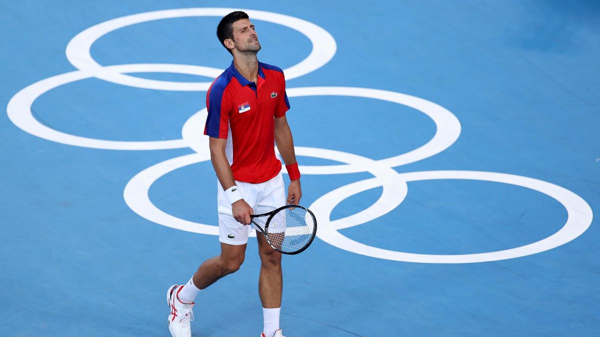 Novak Djokovic of Team Serbia reacts after a point during his Men's Singles Bronze Medal match against Pablo Carreno Busta of Team Spain on day eight of the Tokyo 2020 Olympic Games at Ariake Tennis Park on July 31, 2021 in Tokyo, Japan