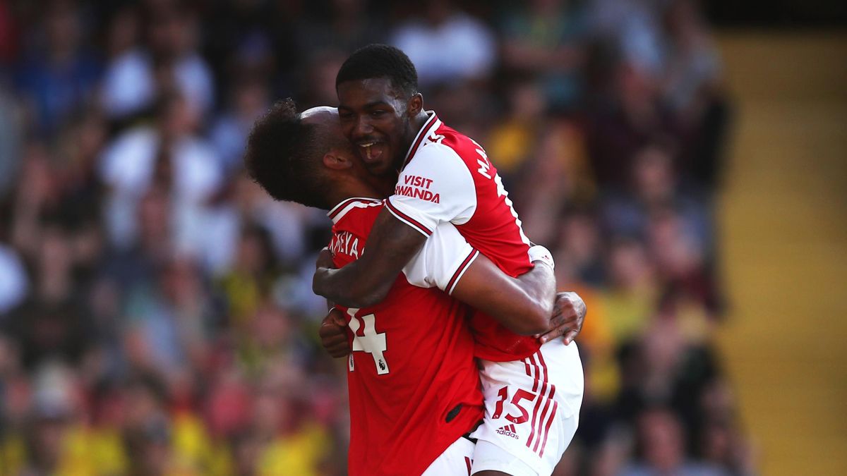 Pierre-Emerick Aubameyang celebrates scoring his 2nd goal for Arsenal with Ainsley Maitland-Niles during the Premier League match between Watford FC and Arsenal FC at Vicarage Road on September 15, 2019