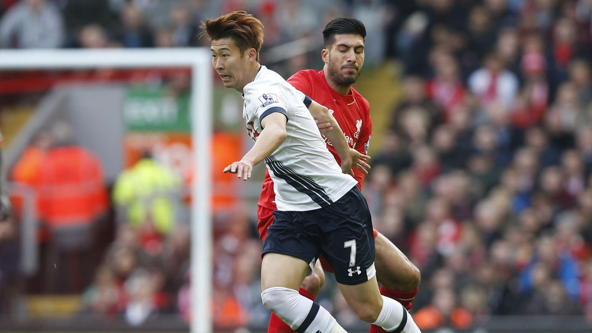 Tottenham's Son Heung-Min in action with Liverpool's Emre Can