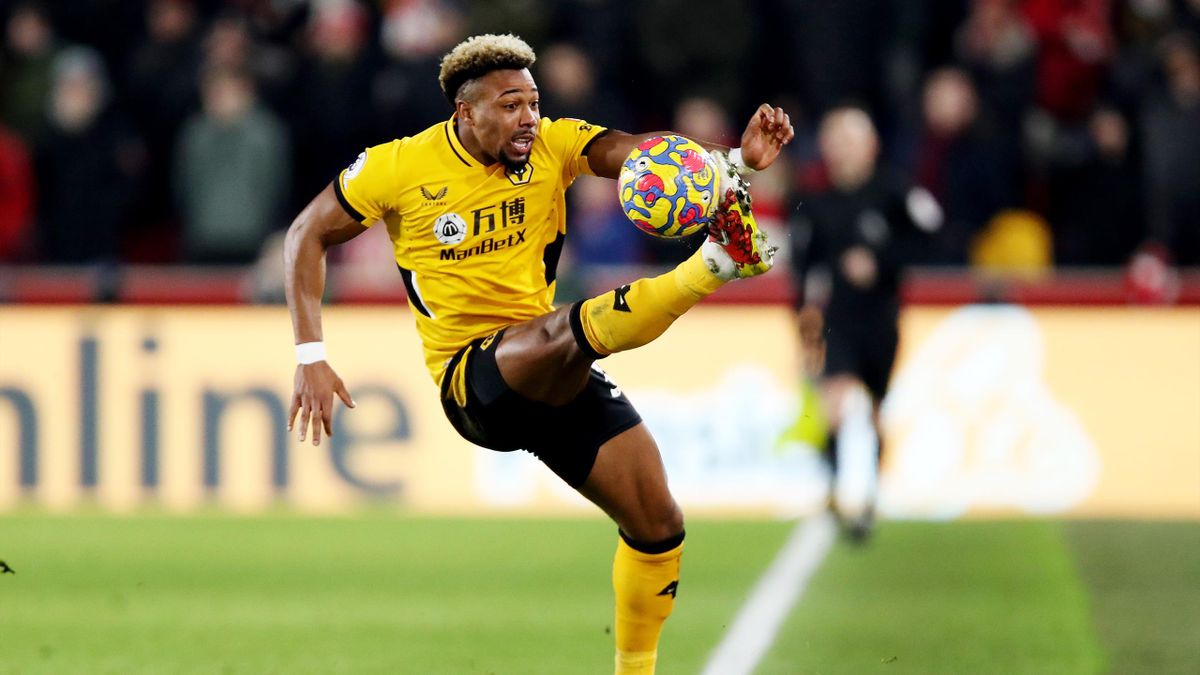 Adama Traore of Wolverhampton Wanderers attempts to control the ball during the Premier League match between Brentford and Wolverhampton Wanderers at Brentford Community Stadium on January 22, 2022 in Brentford, England. (Photo by Jack Thomas - WWFC)
