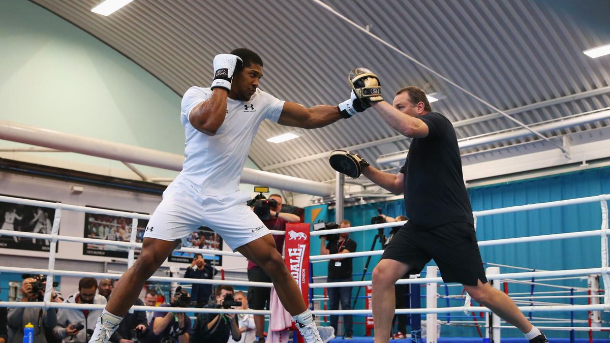 Anthony Joshua takes part in a training session with trainer Rob McCracken during the Anthony Joshua Media Day at English Institute of Sport on September 12, 2018 in Sheffield, England.