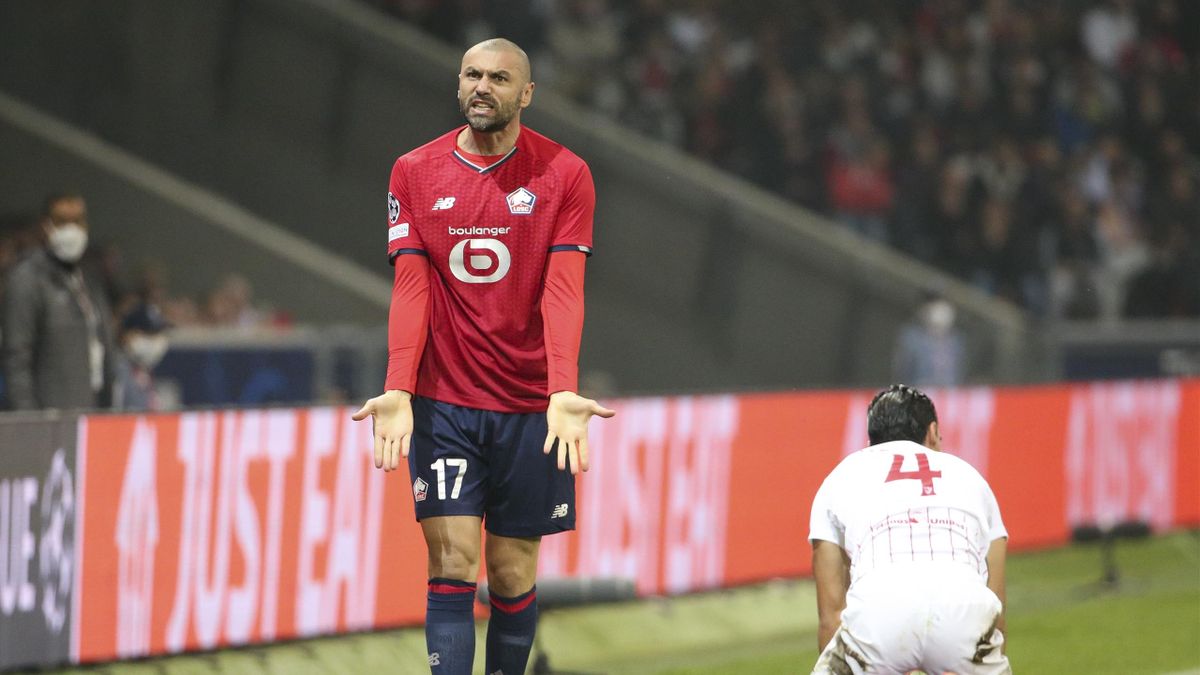 Burak Yilmaz of Lille reacts during the UEFA Champions League group G match between Lille OSC (LOSC) and Sevilla FC at Stade Pierre-Mauroy on October 20, 2021 in Lille, France