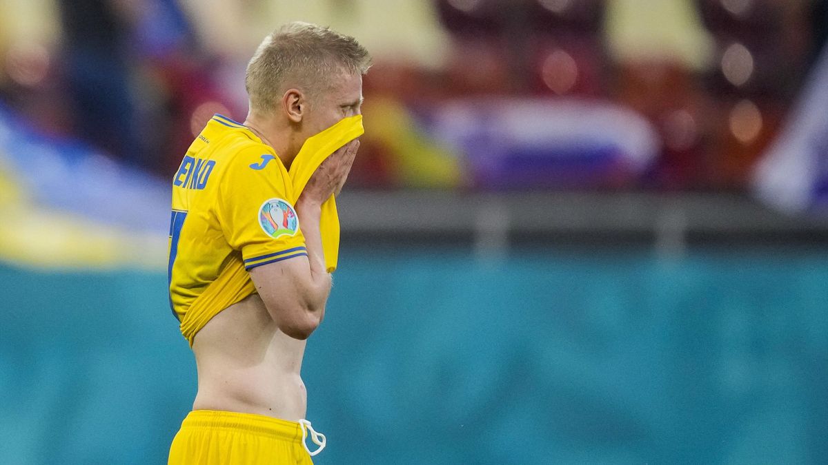 Ukraine's defender Oleksandr Zinchenko reacts after losing the UEFA EURO 2020 Group C football match between Ukraine and Austria at the National Arena in Bucharest on June 21, 2021