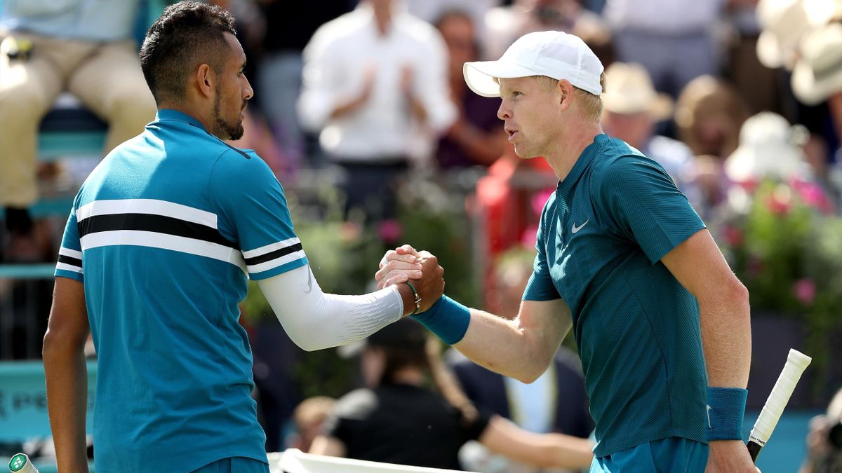 Nick Kyrgios of Australia is congratulated after his men's singles match by Kyle Edmund of Great Britain during Day Four of the Fever-Tree Championships at Queens Club on June 21, 2018 in London, United Kingdom.