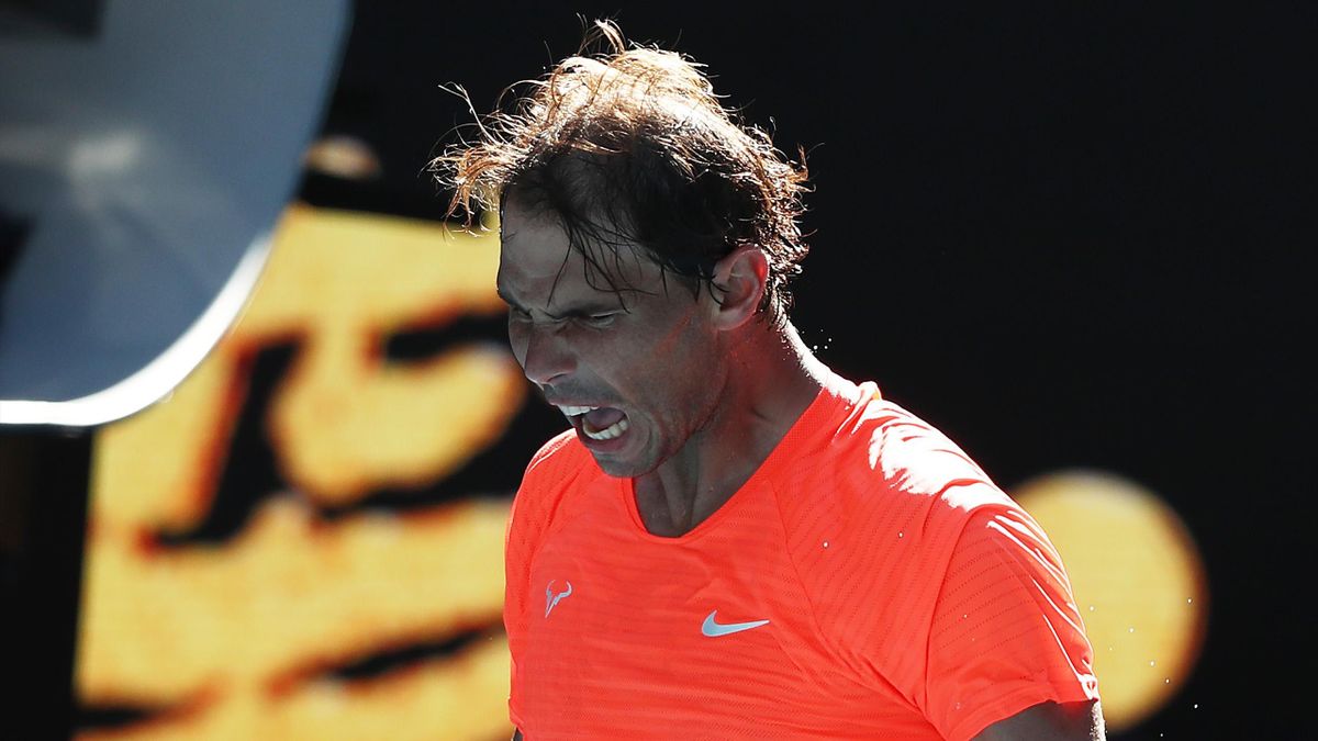 Rafael Nadal of Spain celebrates after winning match point in his Men's Singles first round match against Laslo Djere of Serbia during day two of the 2021 Australian Open at Melbourne Park