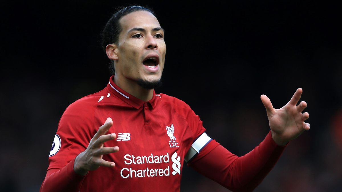 Virgil van Dijk of Liverpool gestures during the Premier League match between Liverpool and Burnley at Anfield on March 10, 2019 in Liverpool, United Kingdom.