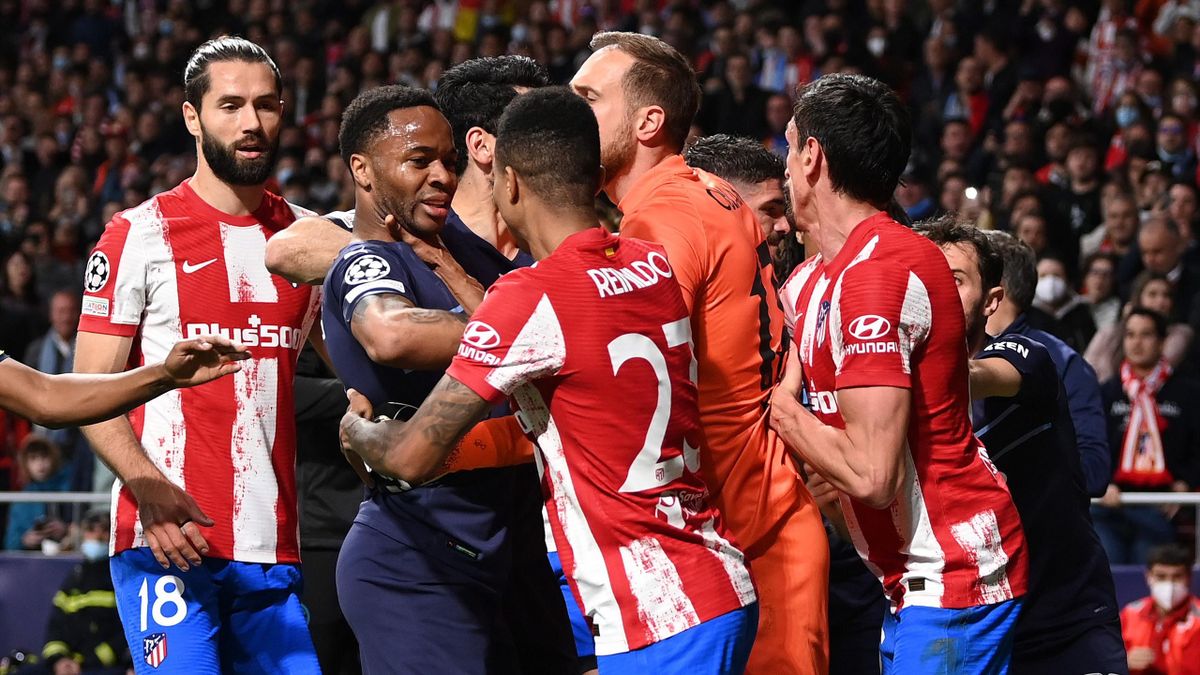 Raheem Sterling of Manchester City clashes with Reinildo Mandava of Atletico Madrid during the UEFA Champions League Quarter Final Leg Two match between Atletico Madrid and Manchester City at Wanda Metropolitano on April 13, 2022 in Madrid, Spain