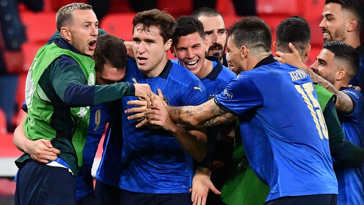 Italy's midfielder Federico Chiesa celebrates scoring the team's first goal during extra-time in the UEFA EURO 2020 round of 16 football match between Italy and Austria at Wembley Stadium in London on June 26, 2021