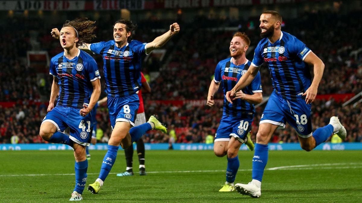 Luke Matheson of Rochdale celebrates after scoring a goal to make it 1-1 during the Carabao Cup Third Round match between Manchester United and Rochdale AFC at Old Trafford on September 25